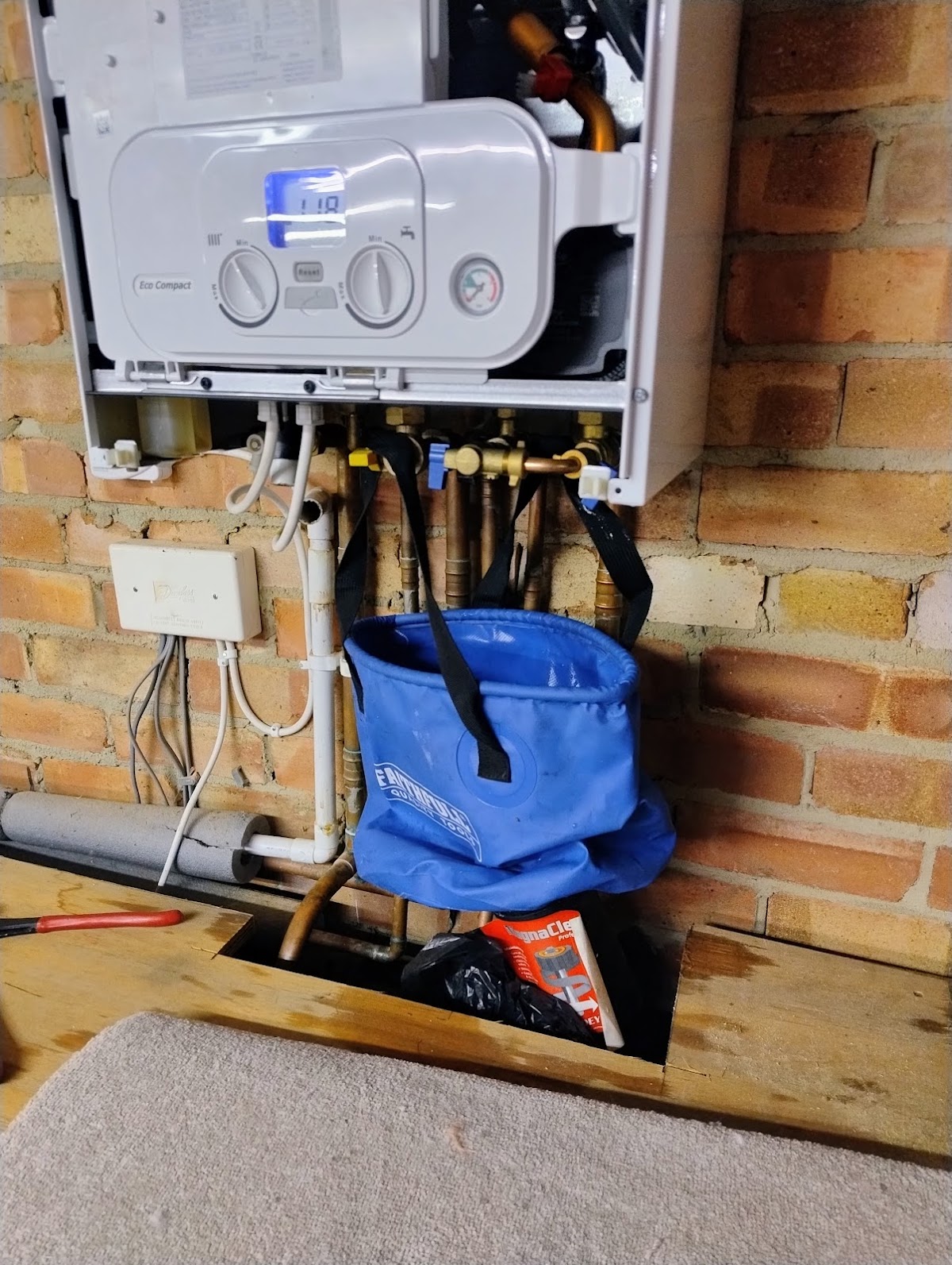 Combi boiler and pipework during a heating repair in Guisborough